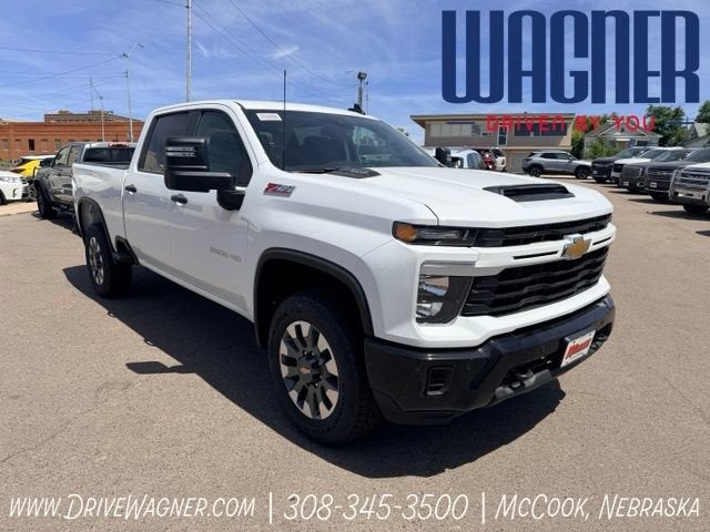 2026 Chevrolet Silverado 2500 HD Custom in Summit White — front three-quarter view