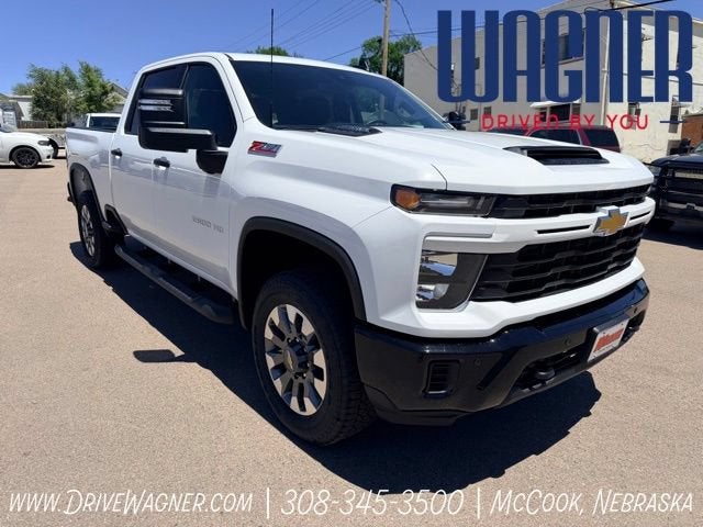 2026 Chevrolet Silverado 2500 HD Custom in Summit White — front three-quarter view