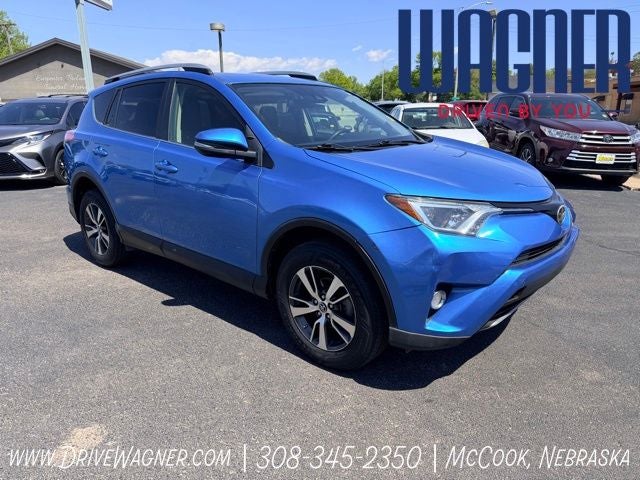 2018 Toyota RAV4 XLE in Electric Storm Blue — front three-quarter view